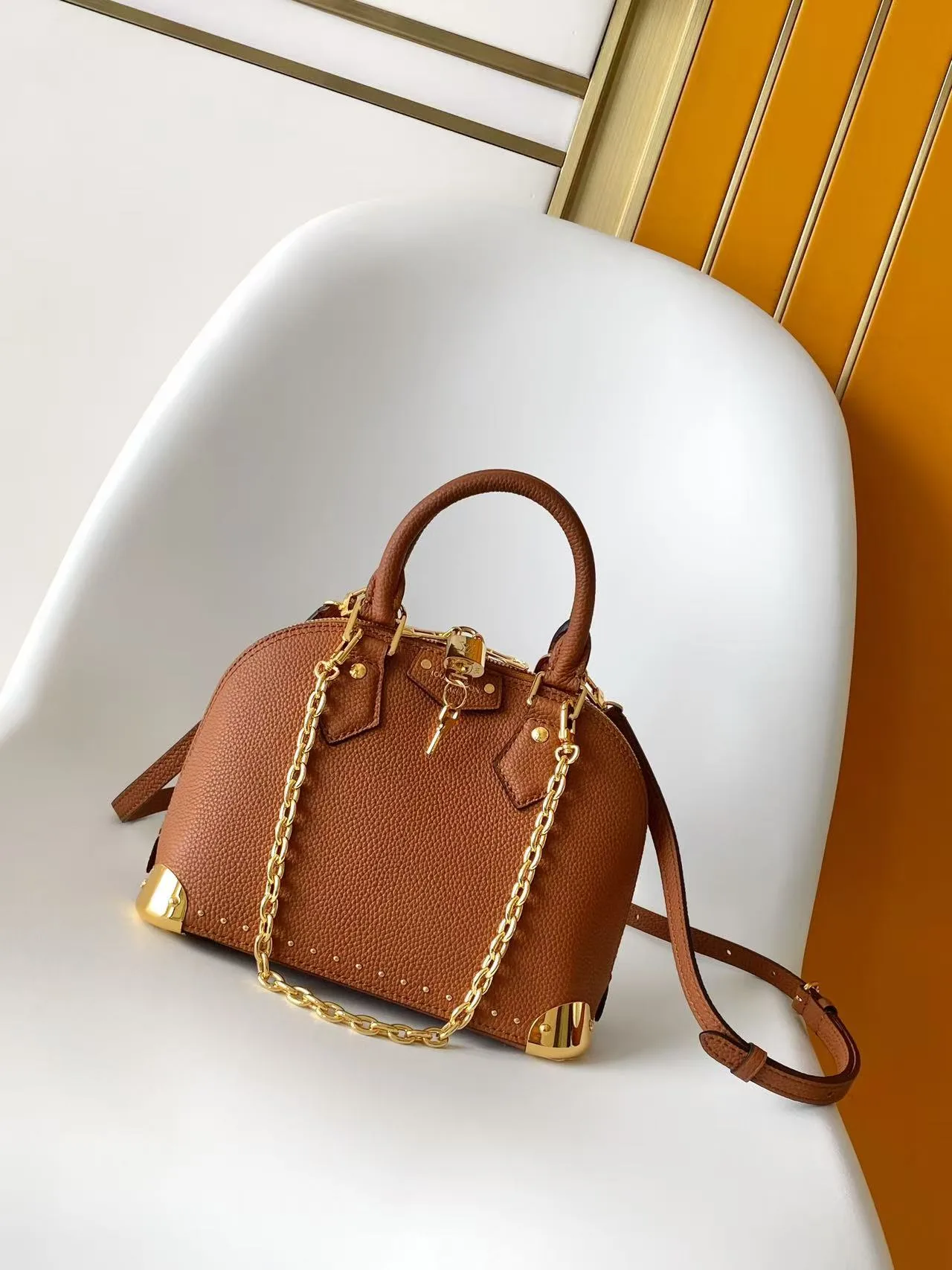 Louis Vuitton Alma Canvas and Leather Top Handle Bag product photo from LabelPicks