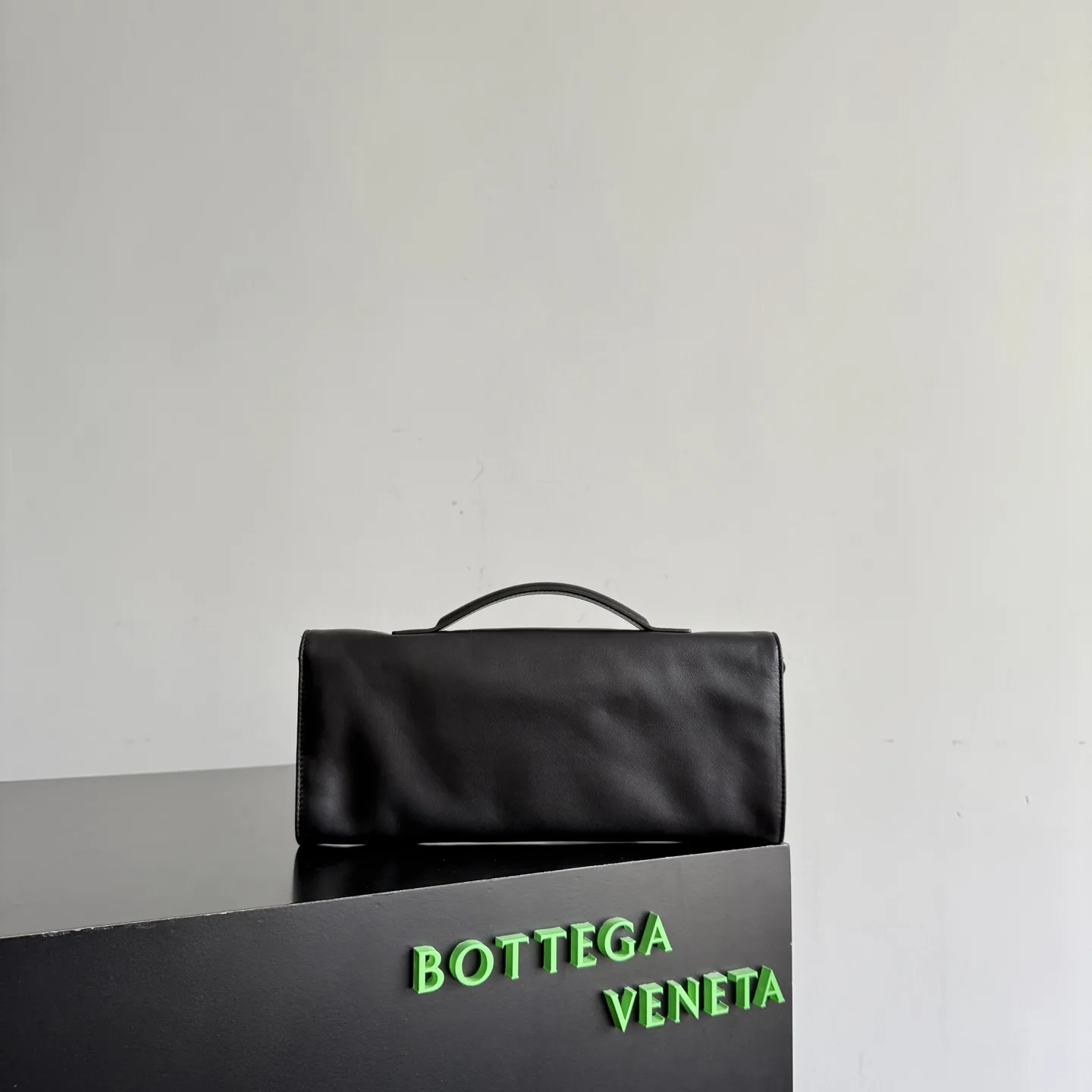 Bottega Veneta Andiamo Intrecciato Woven Leather Clutch product photo from LabelPicks