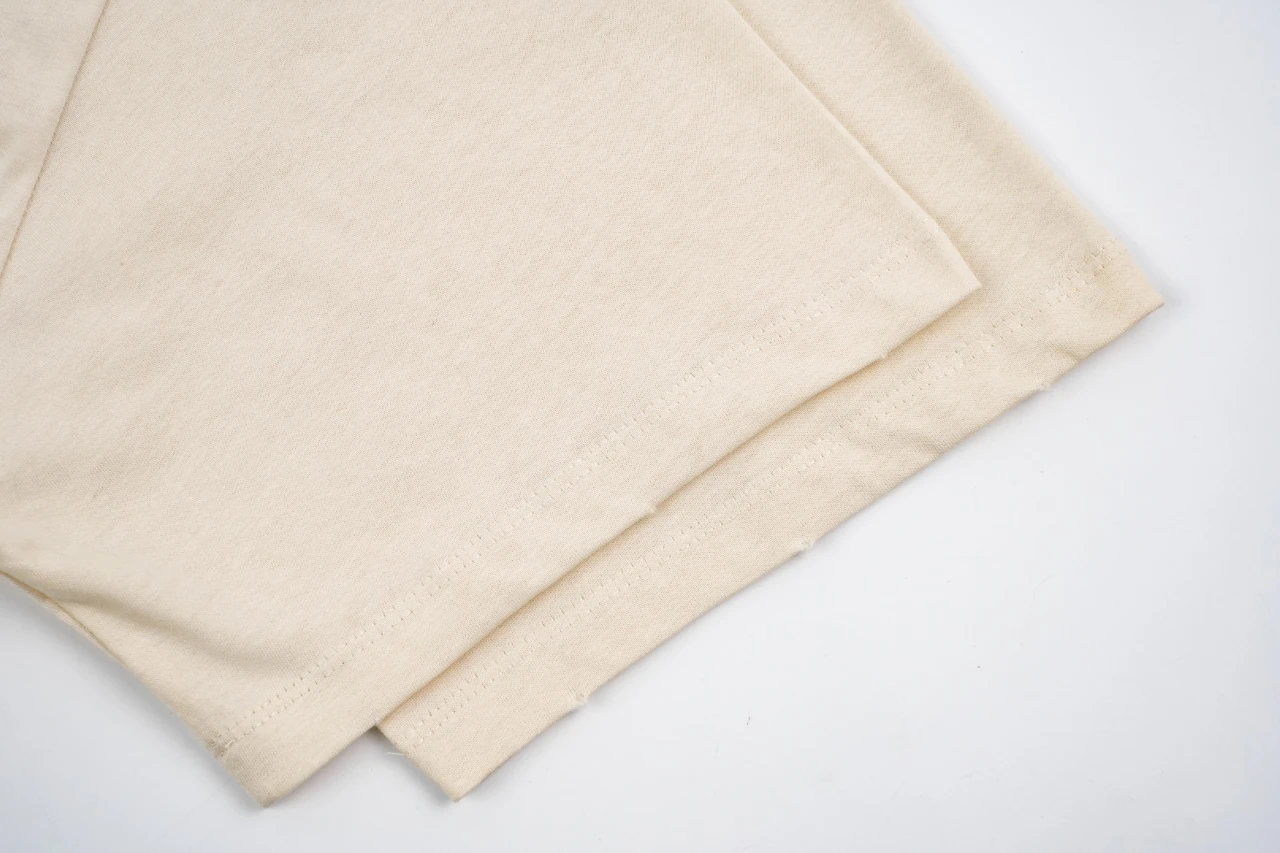 Prada Off-White Distressed Small Logo Triangle T-Shirt product photo from LabelPicks
