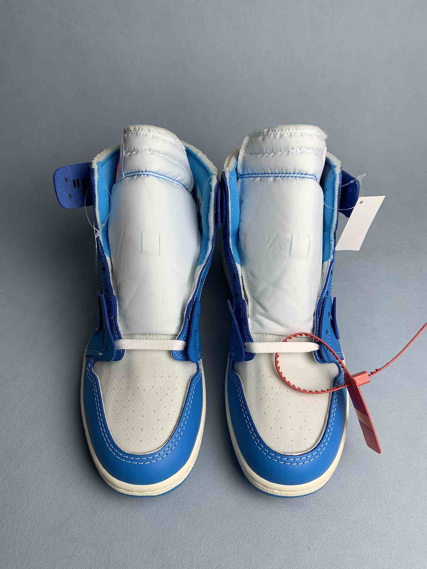 Off-White x Air Jordan 1 “UNC” Shoes