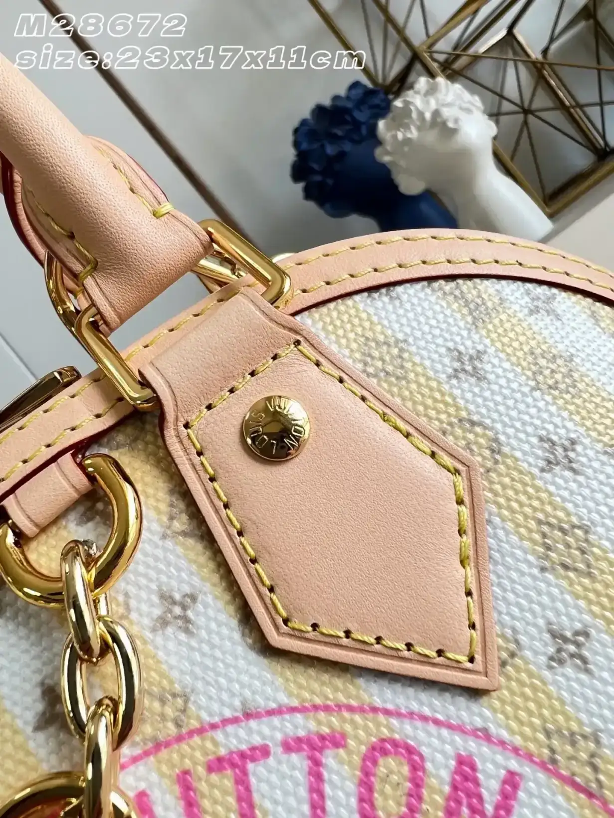 Louis Vuitton Alma Gold Canvas and Leather Top Handle Bag product photo from LabelPicks