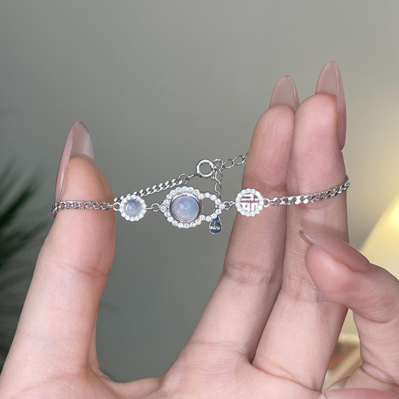 925 sterling silver bracelet with a lucky gourd charm, designed for women, exuding elegance and a retro, modern Chinese style, featuring white jade and the Chinese character for 