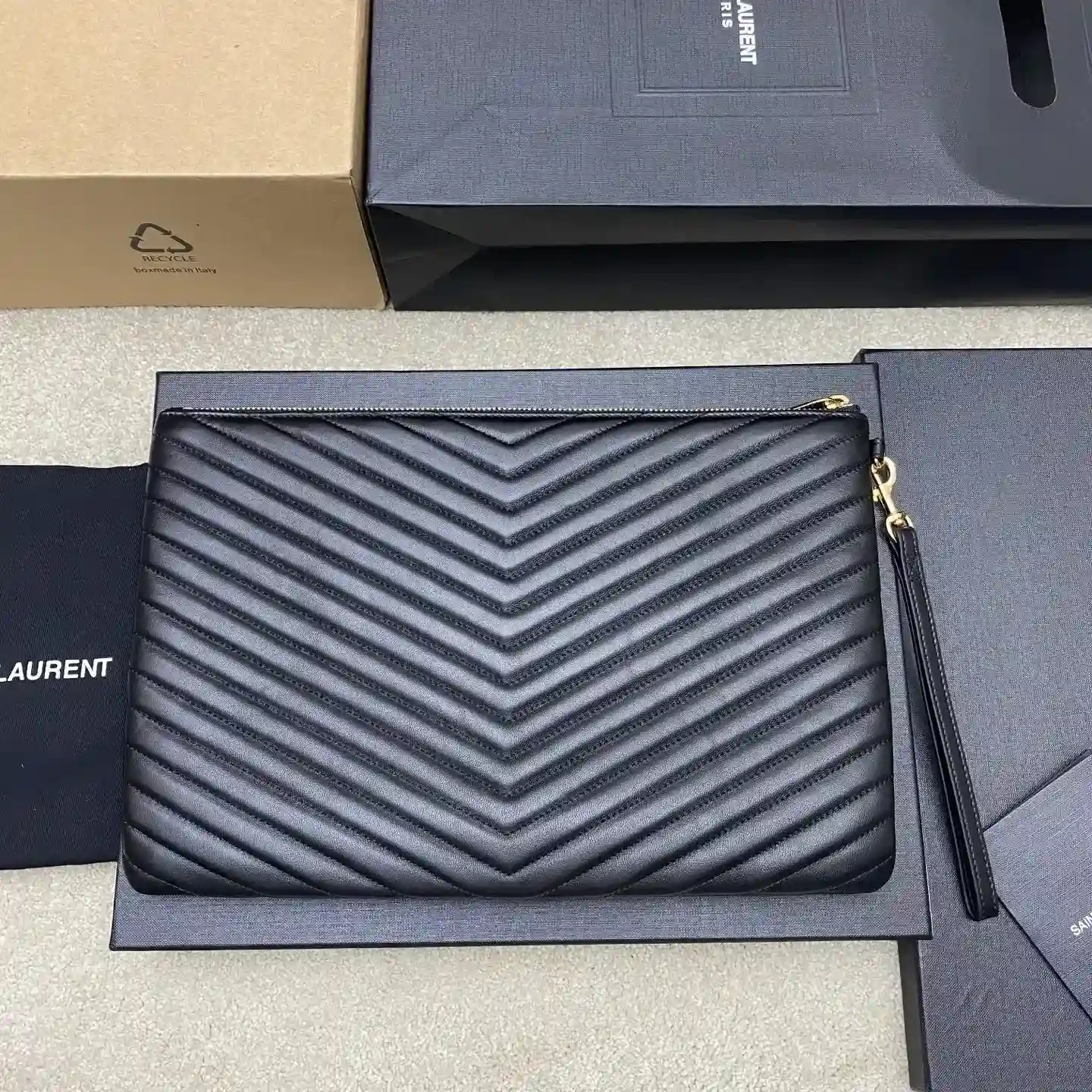 Saint Laurent Quilted Leather Clutch product photo from LabelPicks