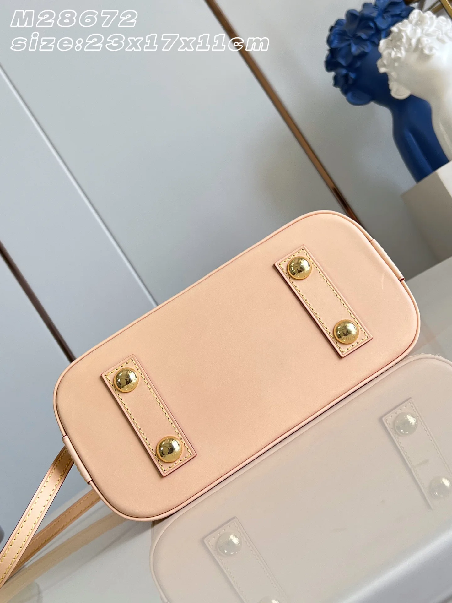 Louis Vuitton Alma Gold Canvas and Leather Top Handle Bag product photo from LabelPicks