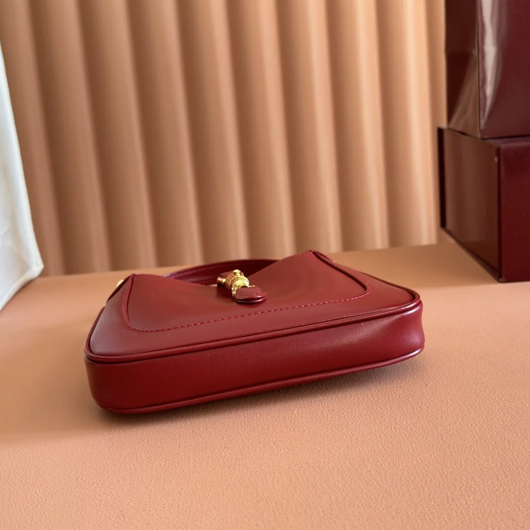 Gucci Canvas and Leather Jackie Shoulder Bag product photo from LabelPicks