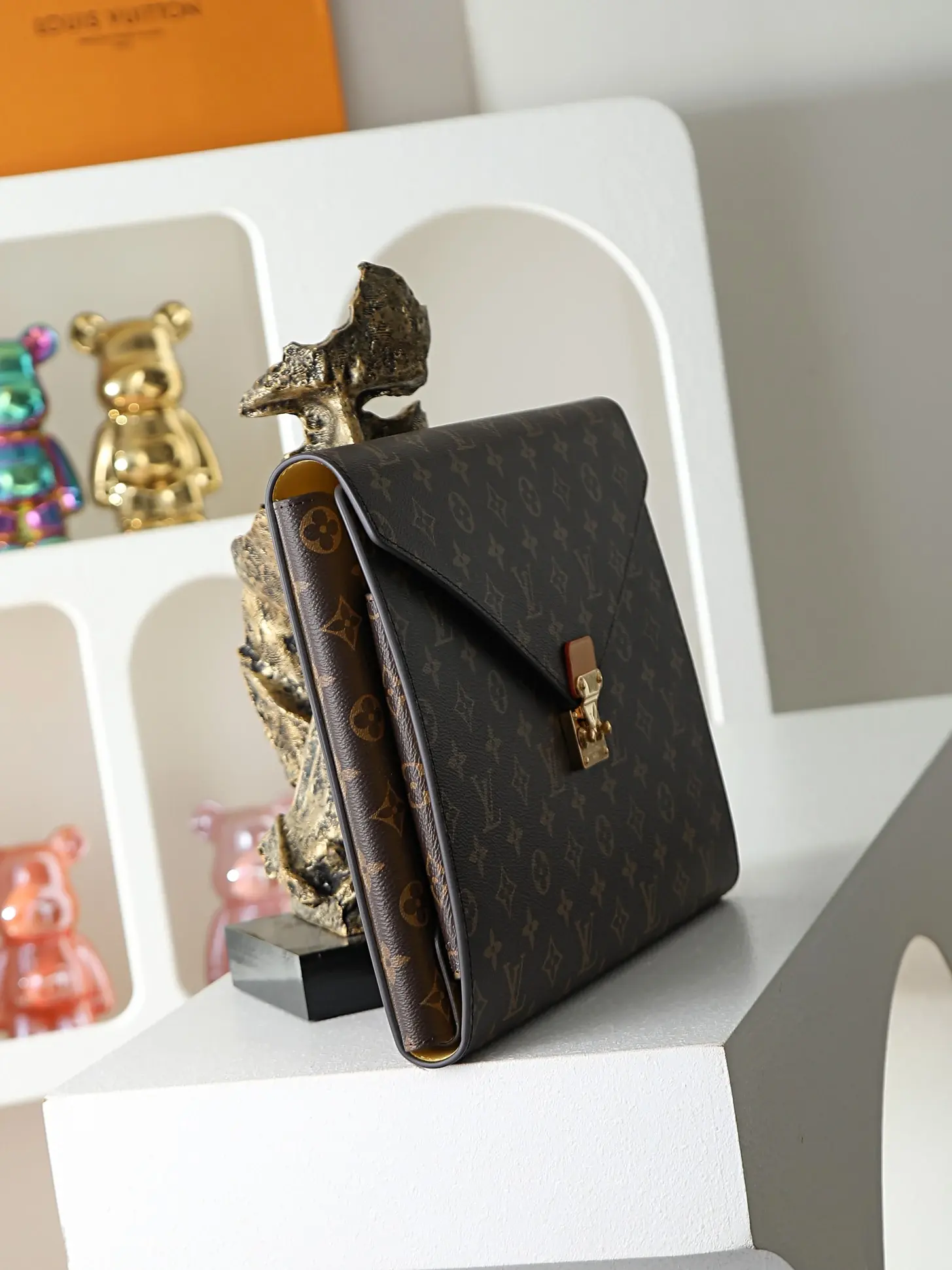 Louis Vuitton Brown Monogram Canvas Clutch product photo from LabelPicks