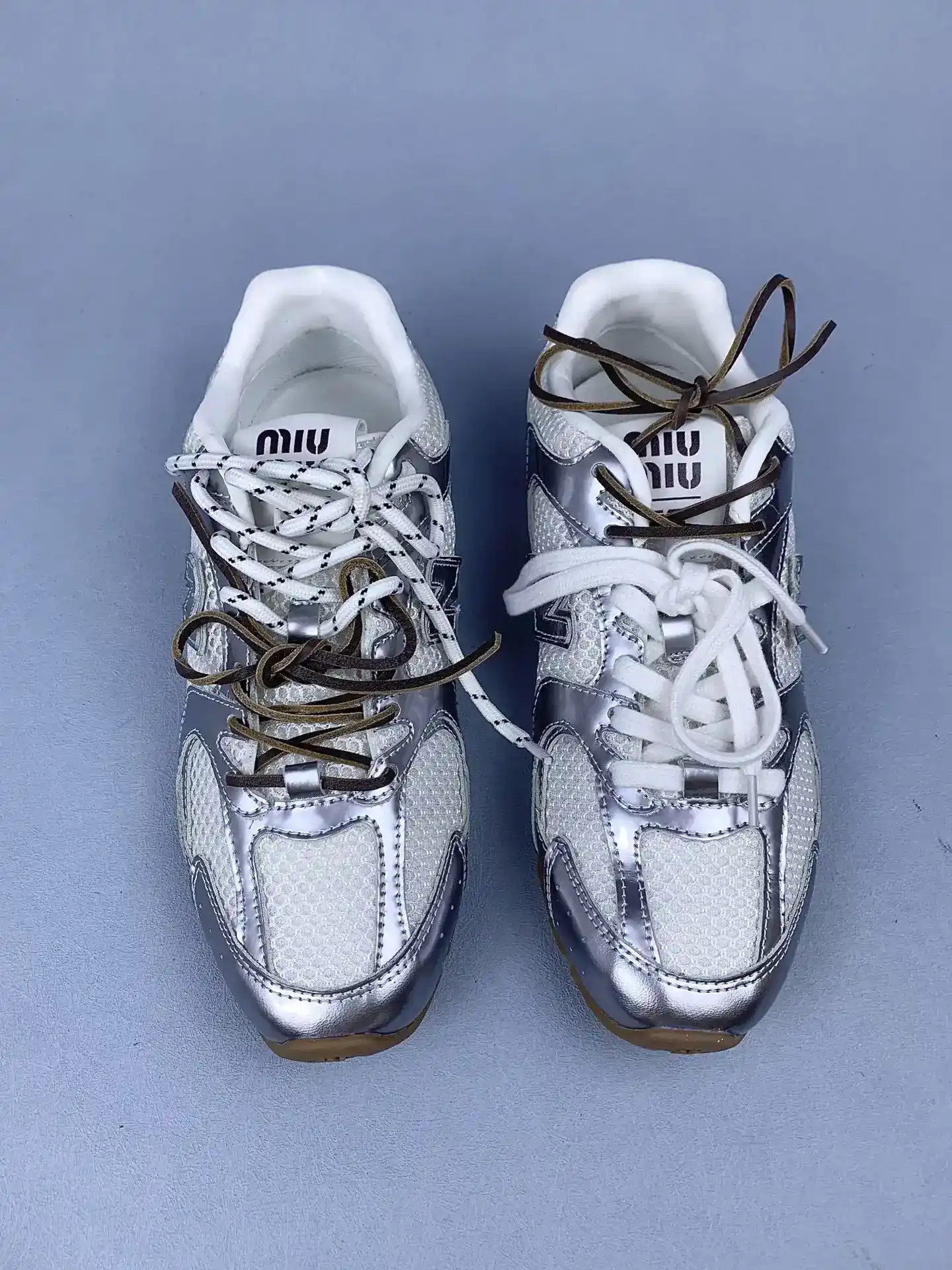 New Balance X Miu Miu 530 SL metallic leather and mesh sneakers product photo from LabelPicks