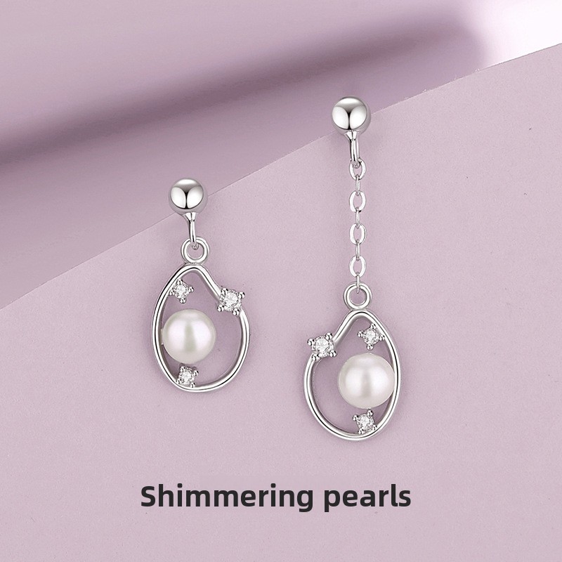 Original design, shimmering pearl earrings for women, made of pure silver, Korean style, elegant and versatile, with a unique and asymmetrical design