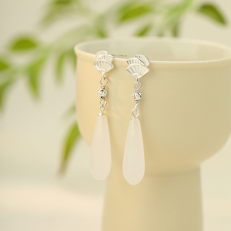 925 sterling silver fan-shaped earrings for women, featuring a Chinese-style design, a new Chinese aesthetic, white jade stone pendants, a long style, and a sophisticated tassel design