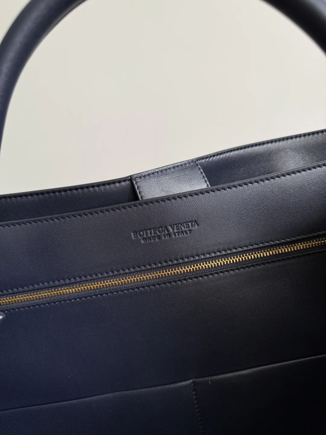 Bottega Veneta Andiamo Blue Intrecciato Woven Leather Top Handle Bag product photo from LabelPicks