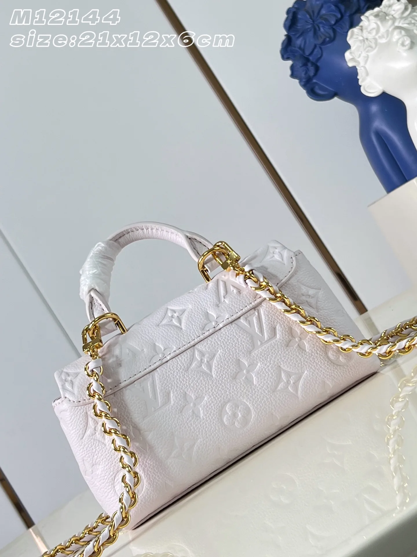 Louis Vuitton Madeleine Woven Leather Top Handle Bag product photo from LabelPicks