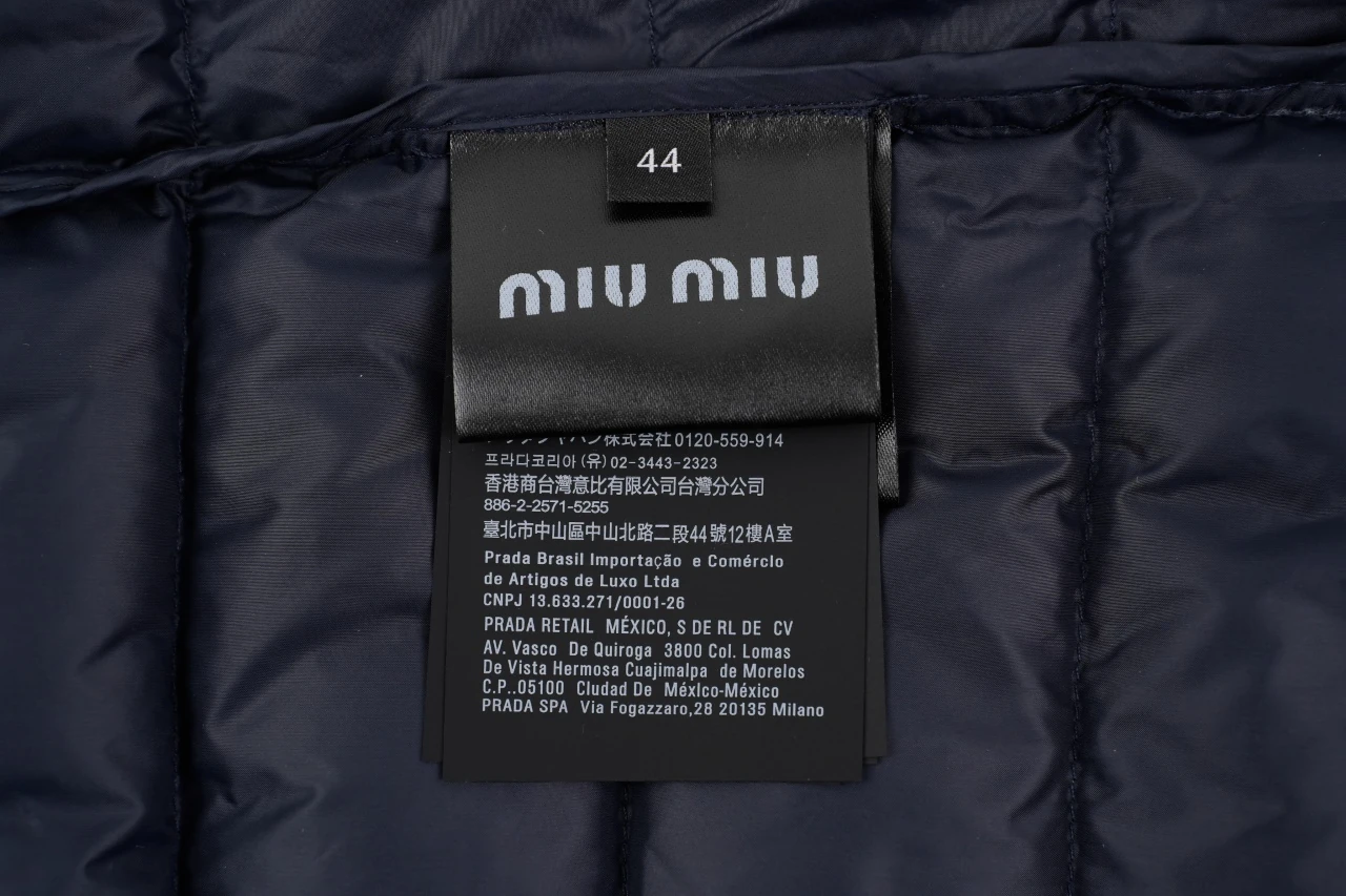 Miu Miu Navy Logo Quilted Down Vest product photo from LabelPicks