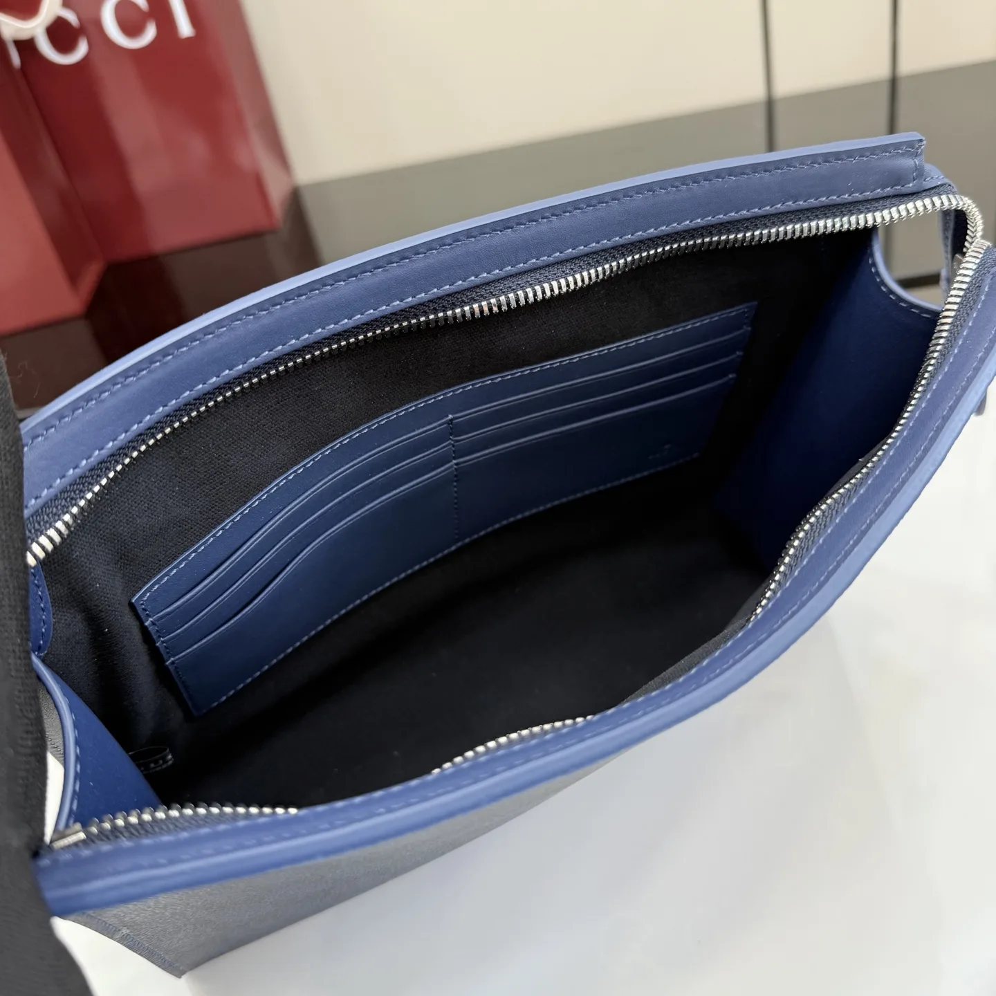 Gucci Navy GG Supreme Canvas Clutch product photo from LabelPicks