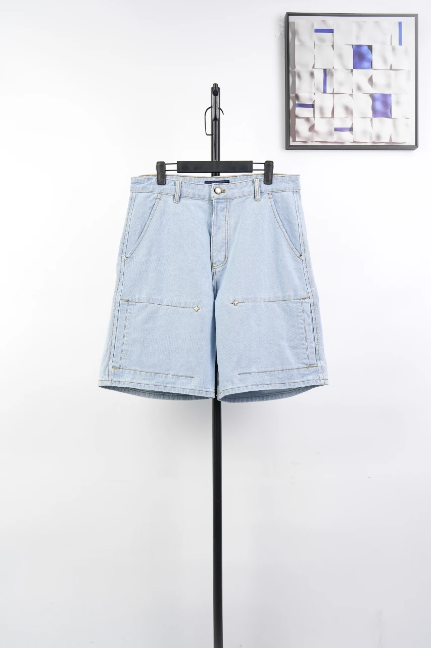 Louis Vuitton Light Blue Logo Embroidered Studded Denim Shorts product photo from LabelPicks