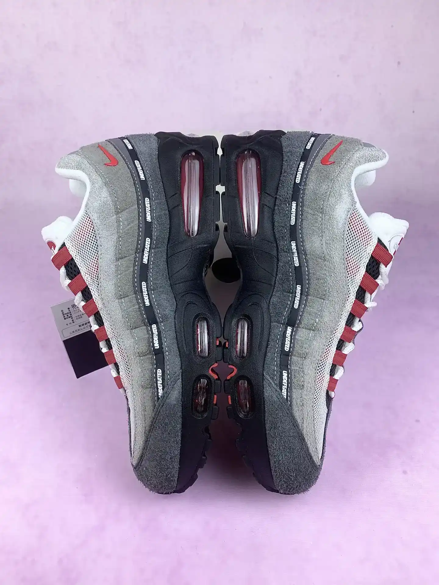 Undefeated x Nike Air Max 95 SP Geo 'Tokyo Bright Crimson' Shoes product photo from LabelPicks