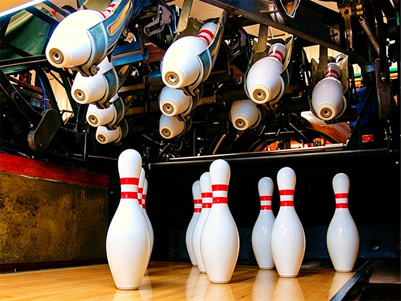 Traditional pinsetter machine pins placement process