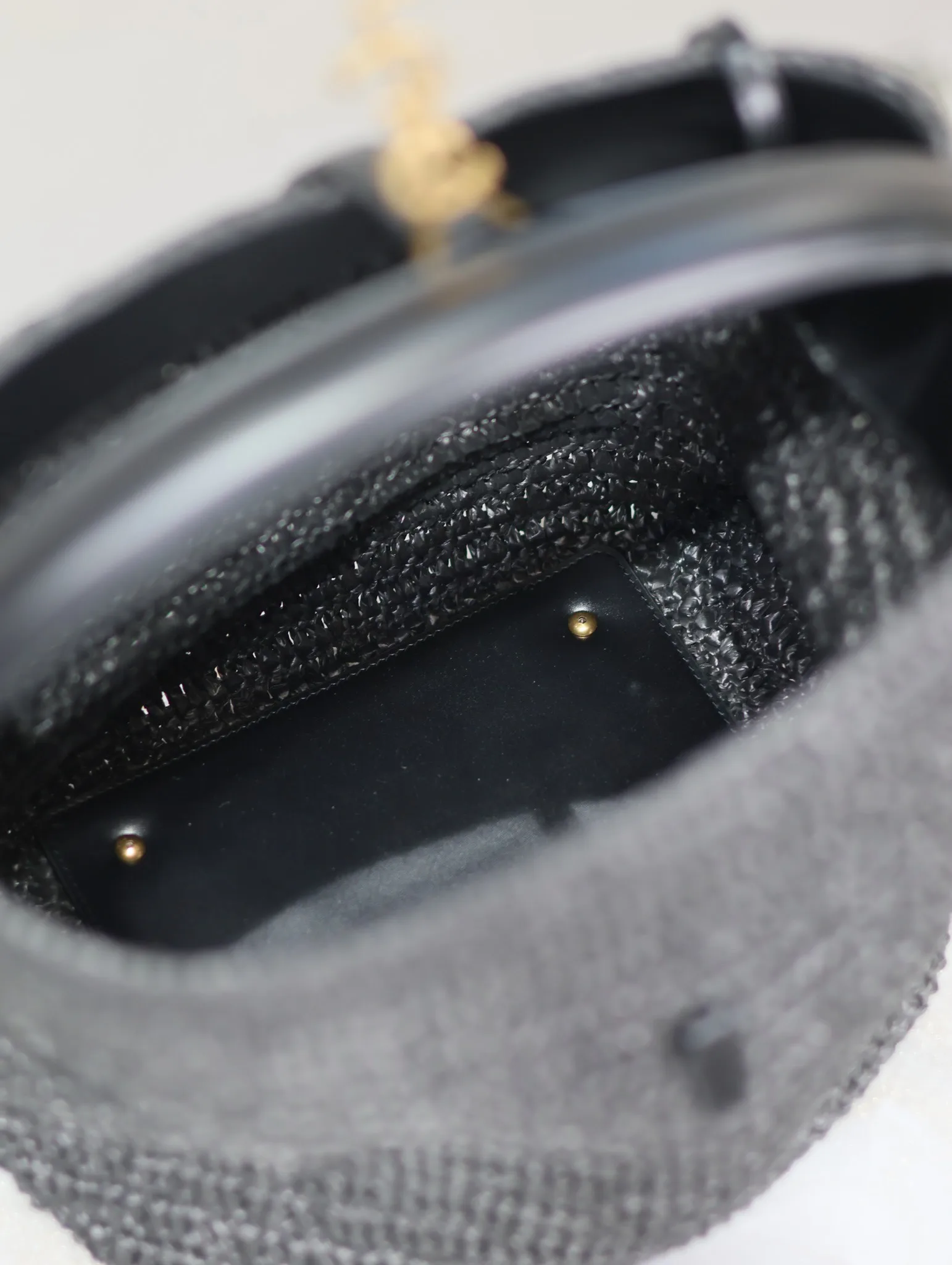 Saint Laurent Black Straw Woven Bucket Bag product photo from LabelPicks