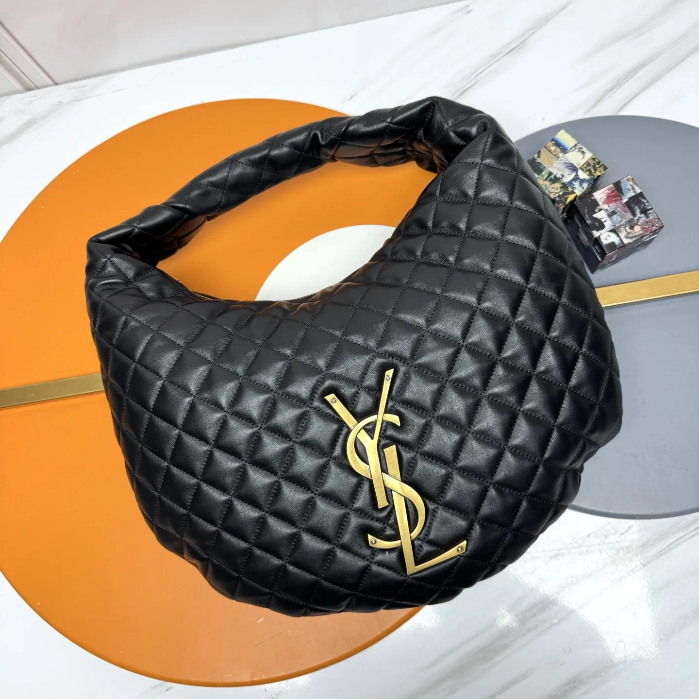Saint Laurent Lambskin Icare Hobo Bag product photo from LabelPicks