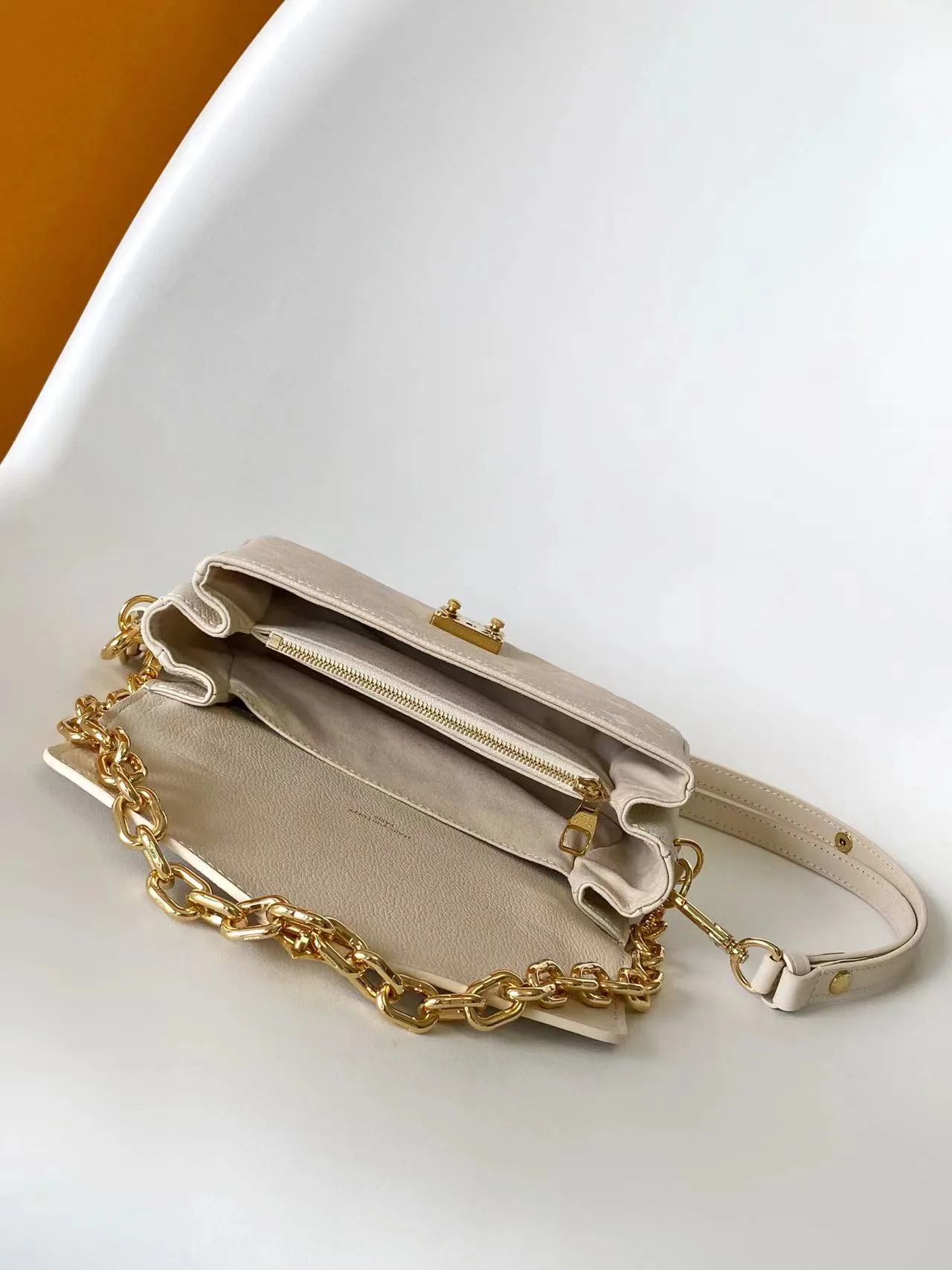 Louis Vuitton Grained Leather Pochette Shoulder Bag product photo from LabelPicks
