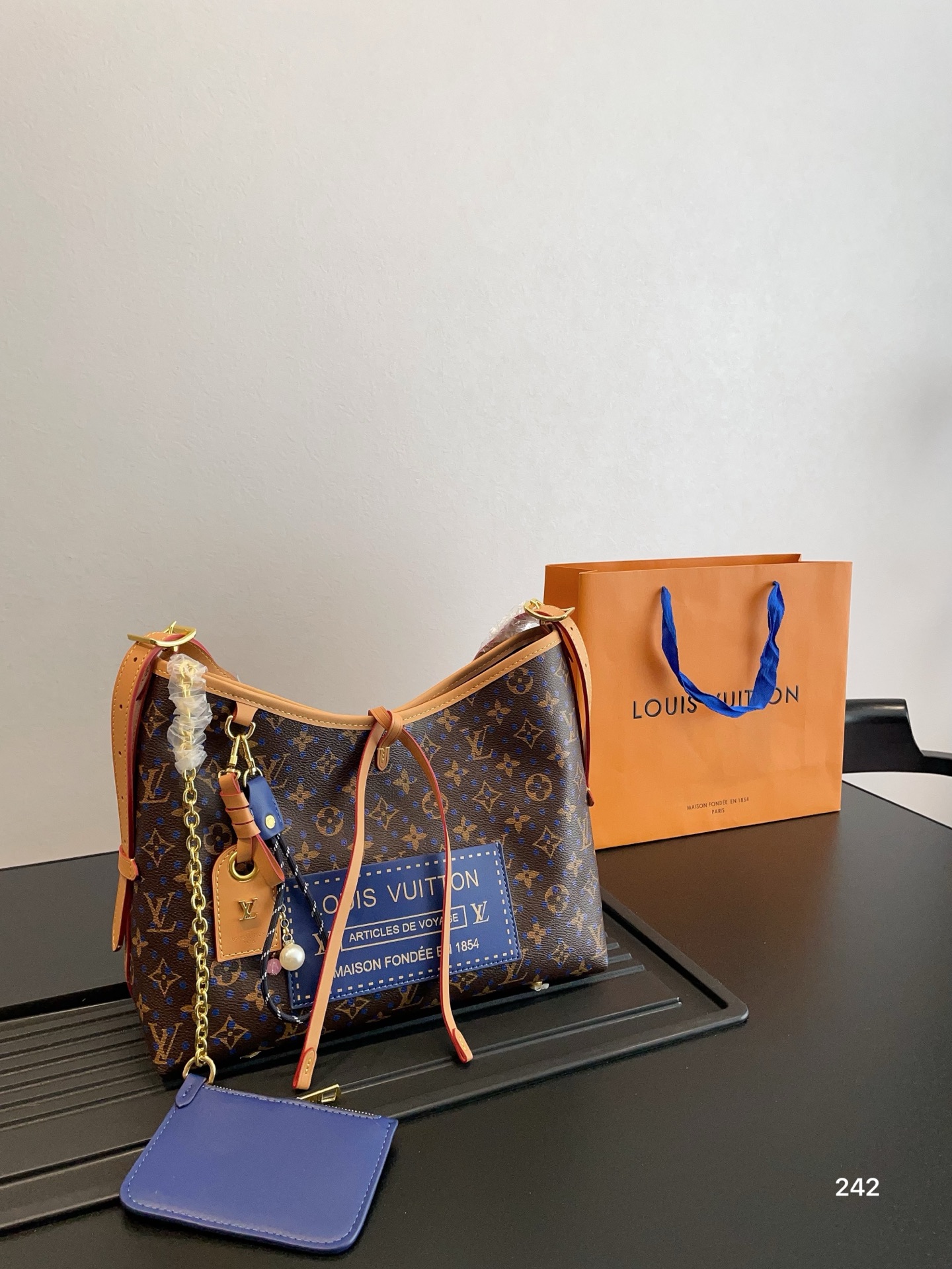 Lv Carryall commuter bag