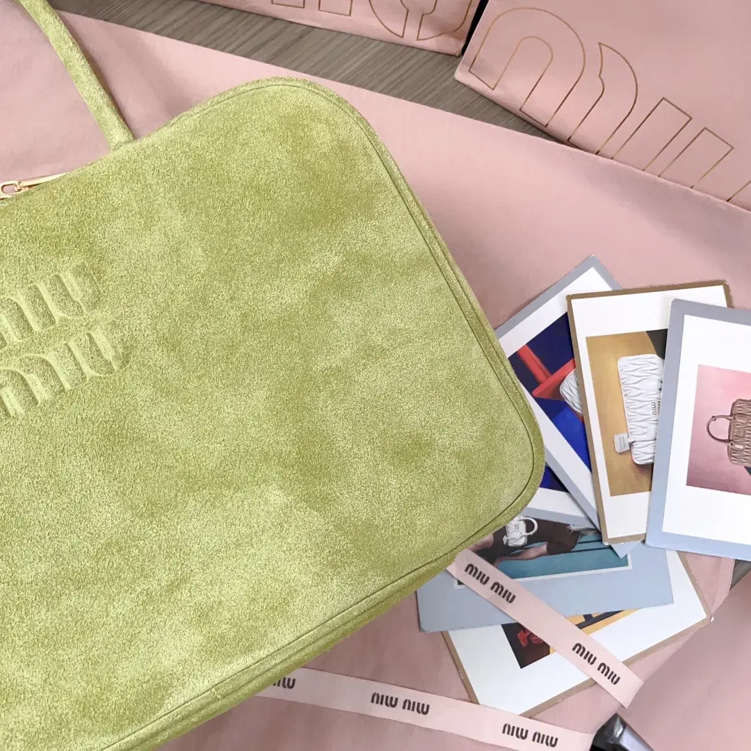 Miu Miu Canvas and Leather Crossbody Bag product photo from LabelPicks