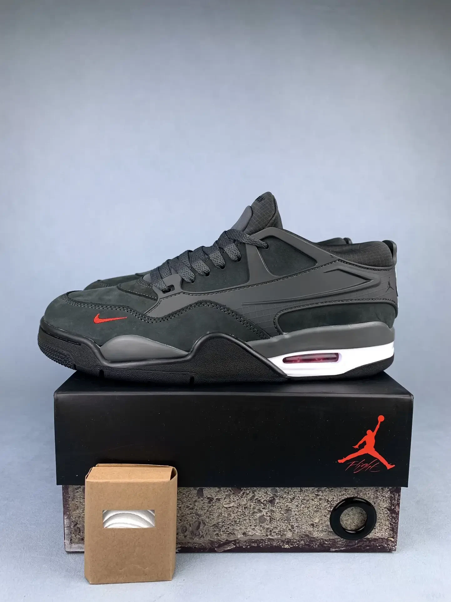 Nigel Sylvester x Air Jordan 4 RM SP “Driveway Grey” Shoes product photo from LabelPicks