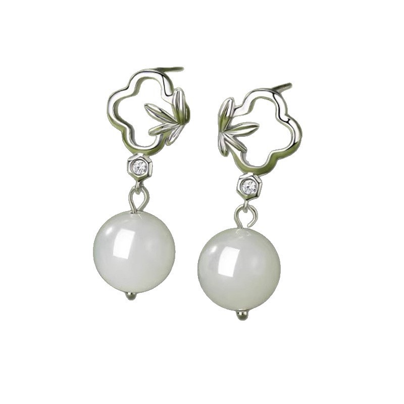 S925 sterling silver four-leaf clover earrings, featuring a new Chinese-style, artistic, and retro design with white jade pendants, creating a light luxury and elegant look