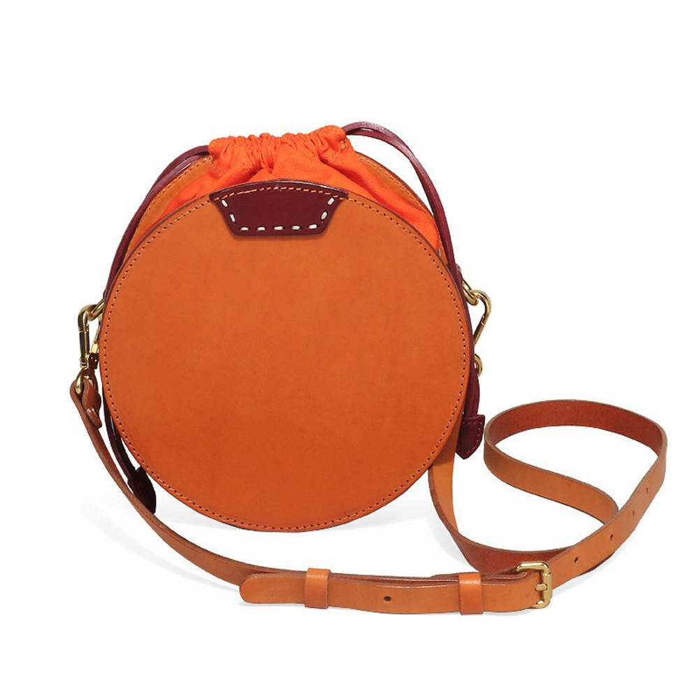 Orange Suede Mini Round Crossbody