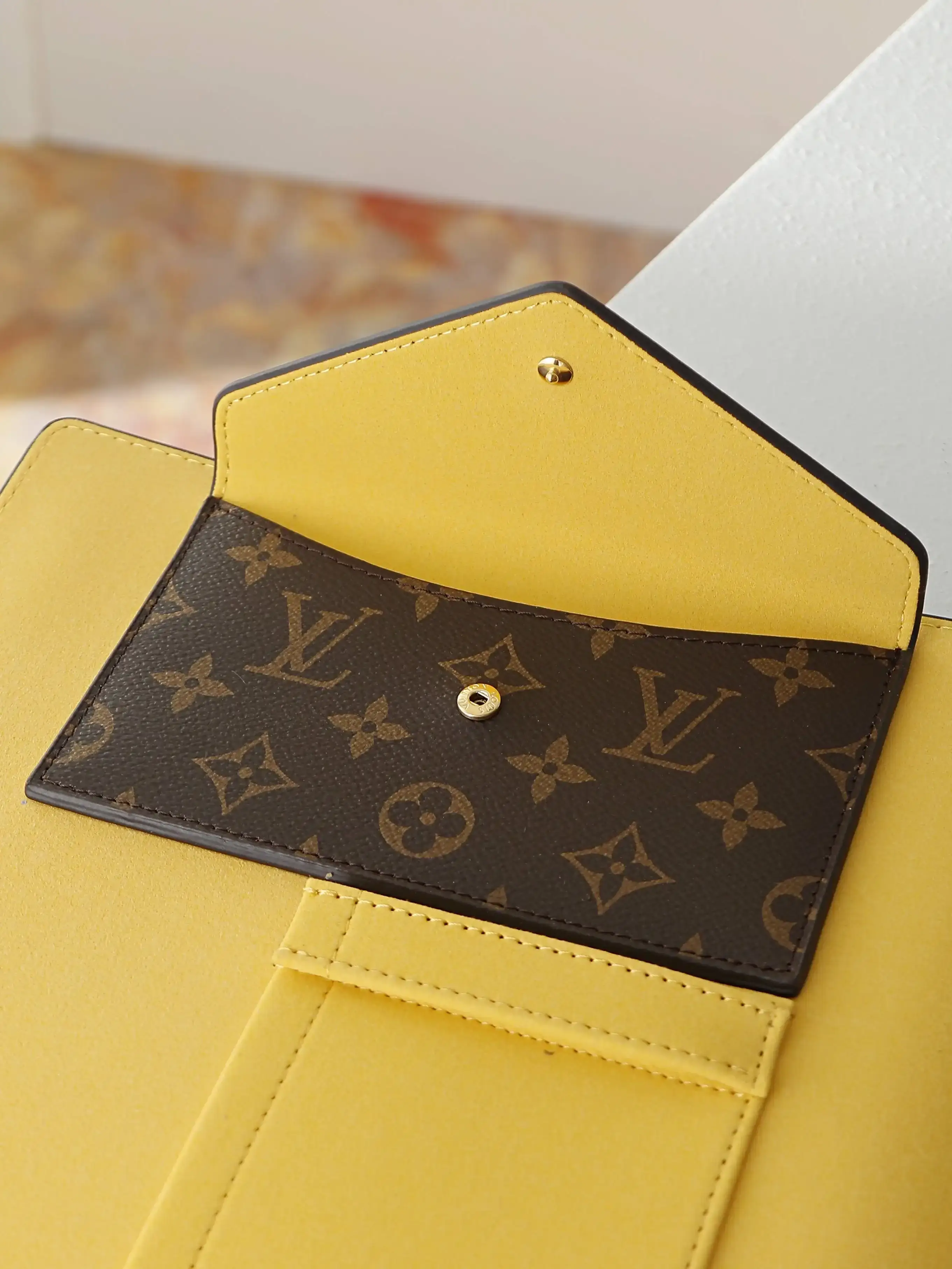 Louis Vuitton Brown Monogram Canvas Clutch product photo from LabelPicks