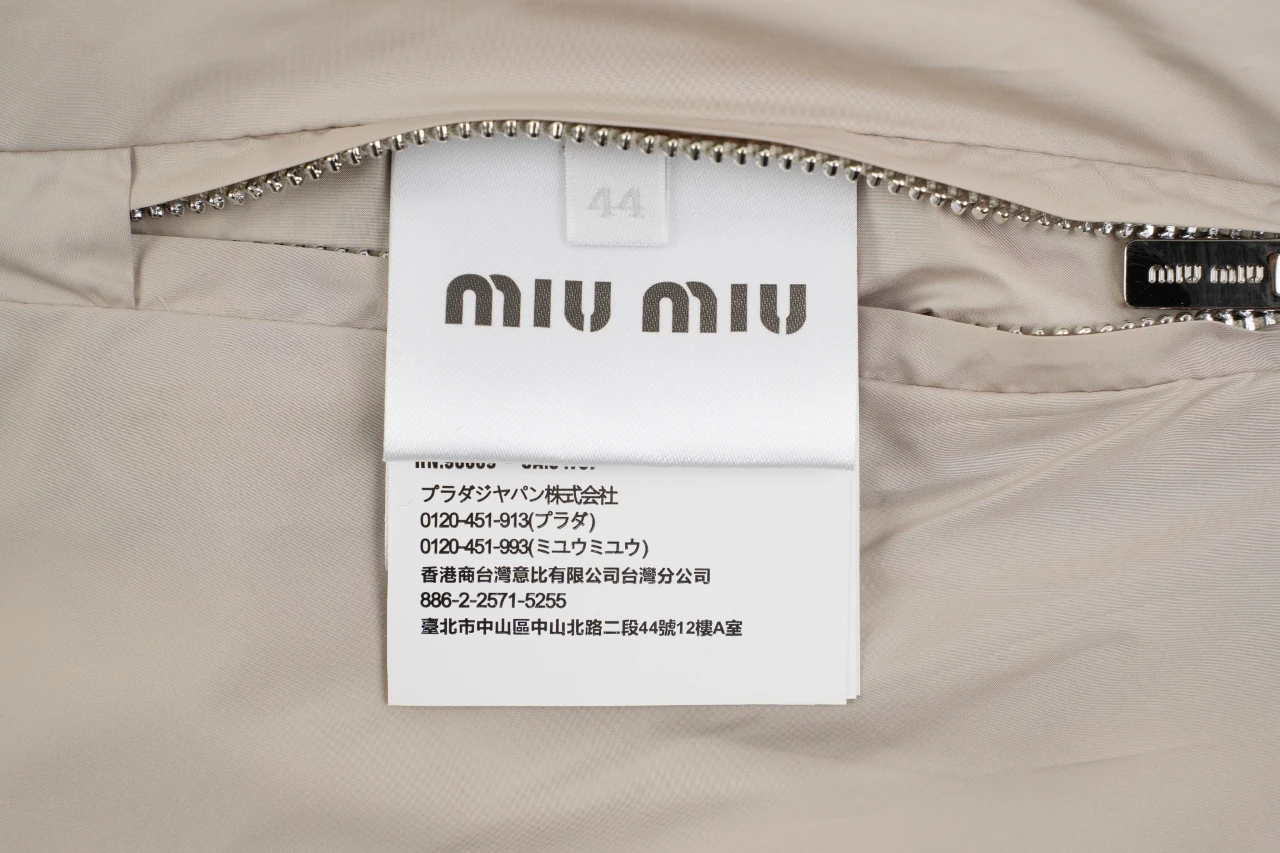 Miu Miu Navy Logo Reversible Down Jacket product photo from LabelPicks