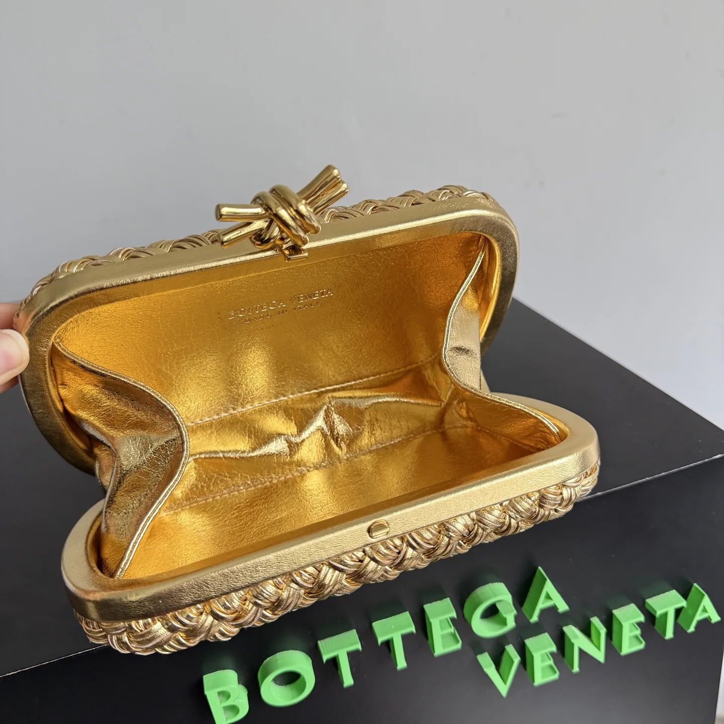 Bottega Veneta Intrecciato Woven Leather Knot Clutch product photo from LabelPicks