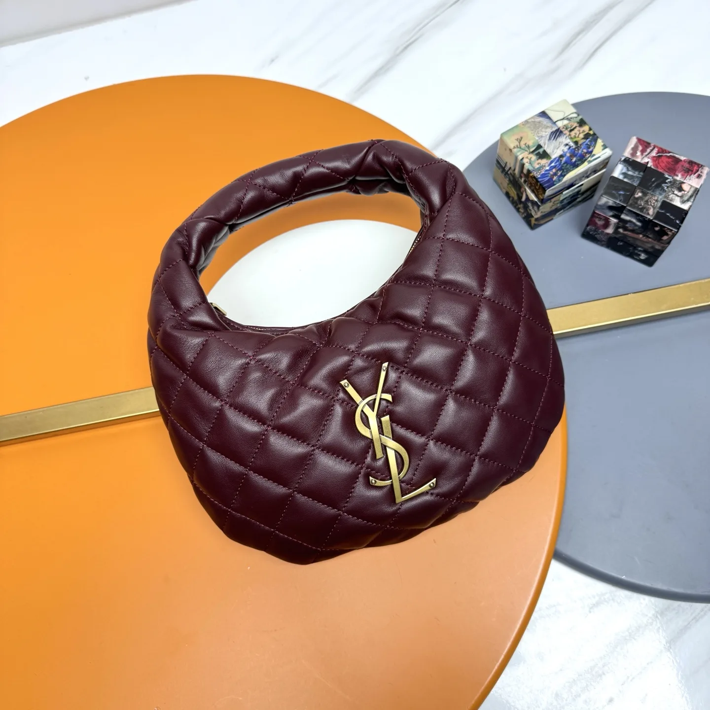 Saint Laurent Icare Burgundy Lambskin Hobo Bag product photo from LabelPicks