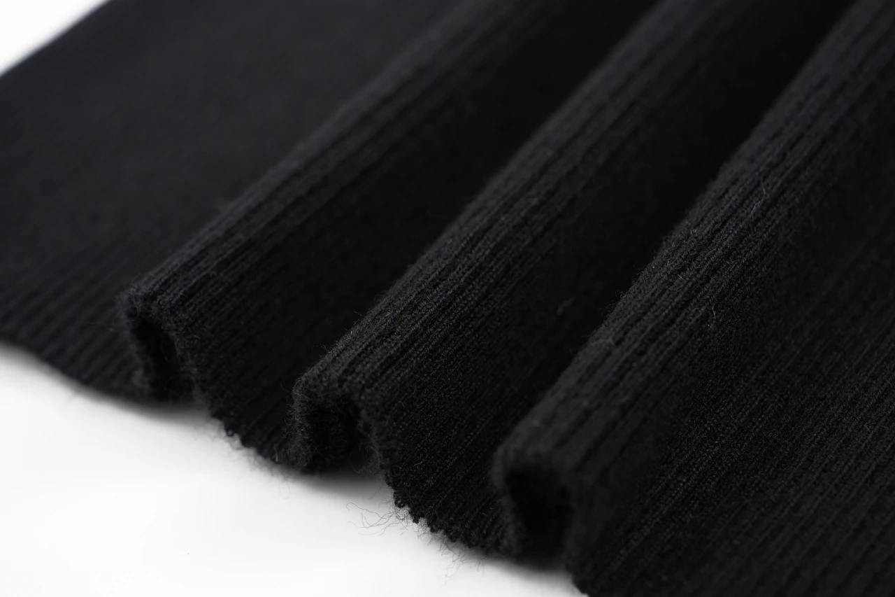 Prada Black Gold Logo Embroidered Half-Sleeve Knit Top product photo from LabelPicks