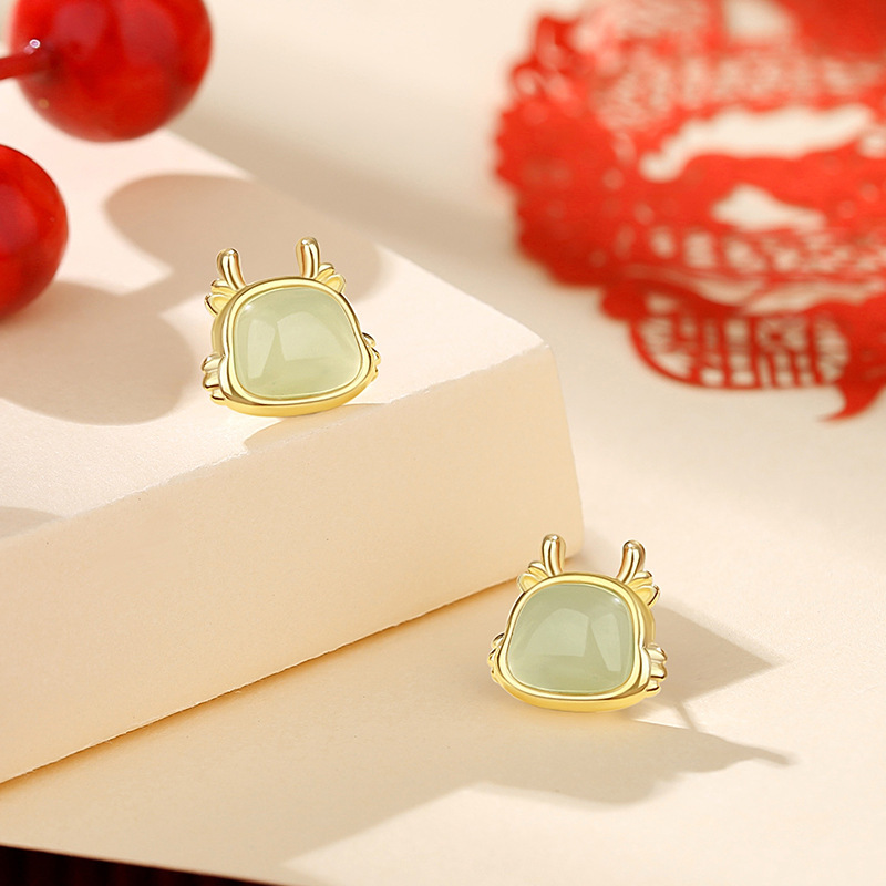 925 sterling silver zodiac earrings with Hetian jade, designed for women born in their zodiac year, featuring a modern Chinese style and a touch of luxury