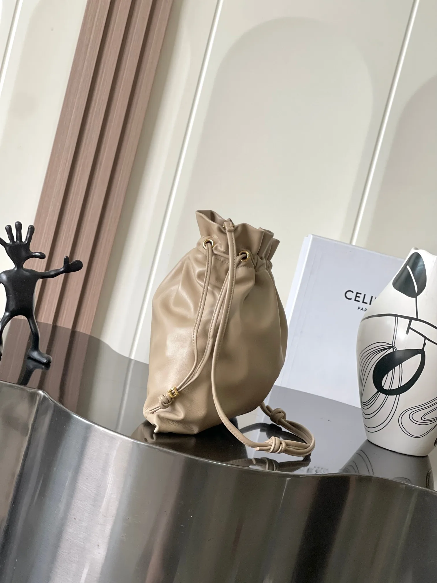 Celine Lambskin Triomphe Bucket Bag product photo from LabelPicks