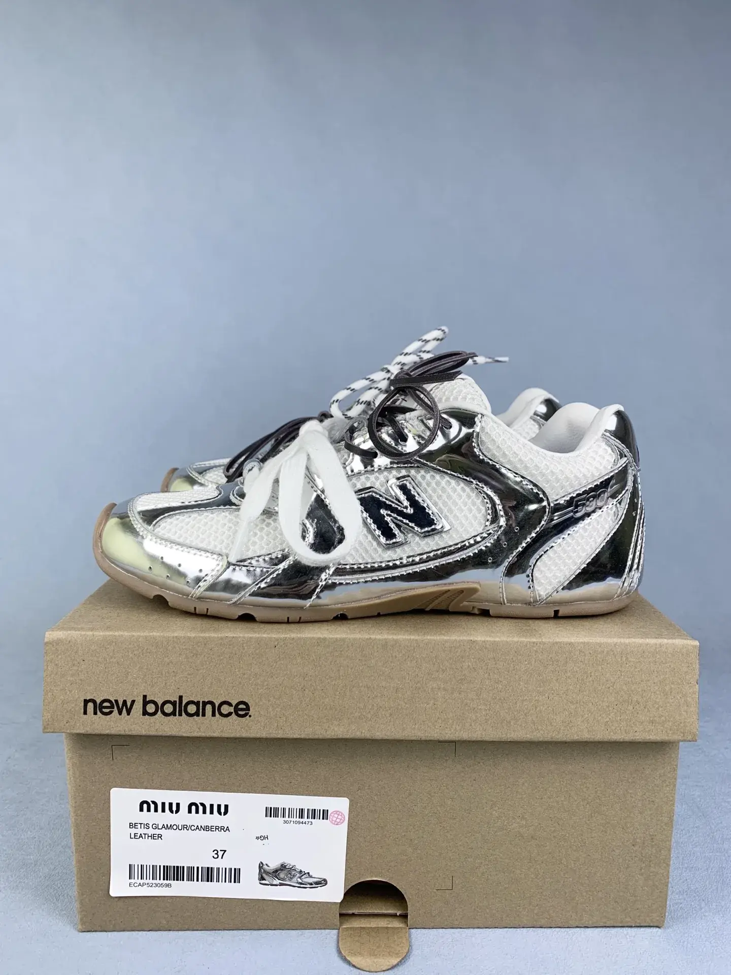 New Balance X Miu Miu 530 SL metallic leather and mesh sneakers product photo from LabelPicks