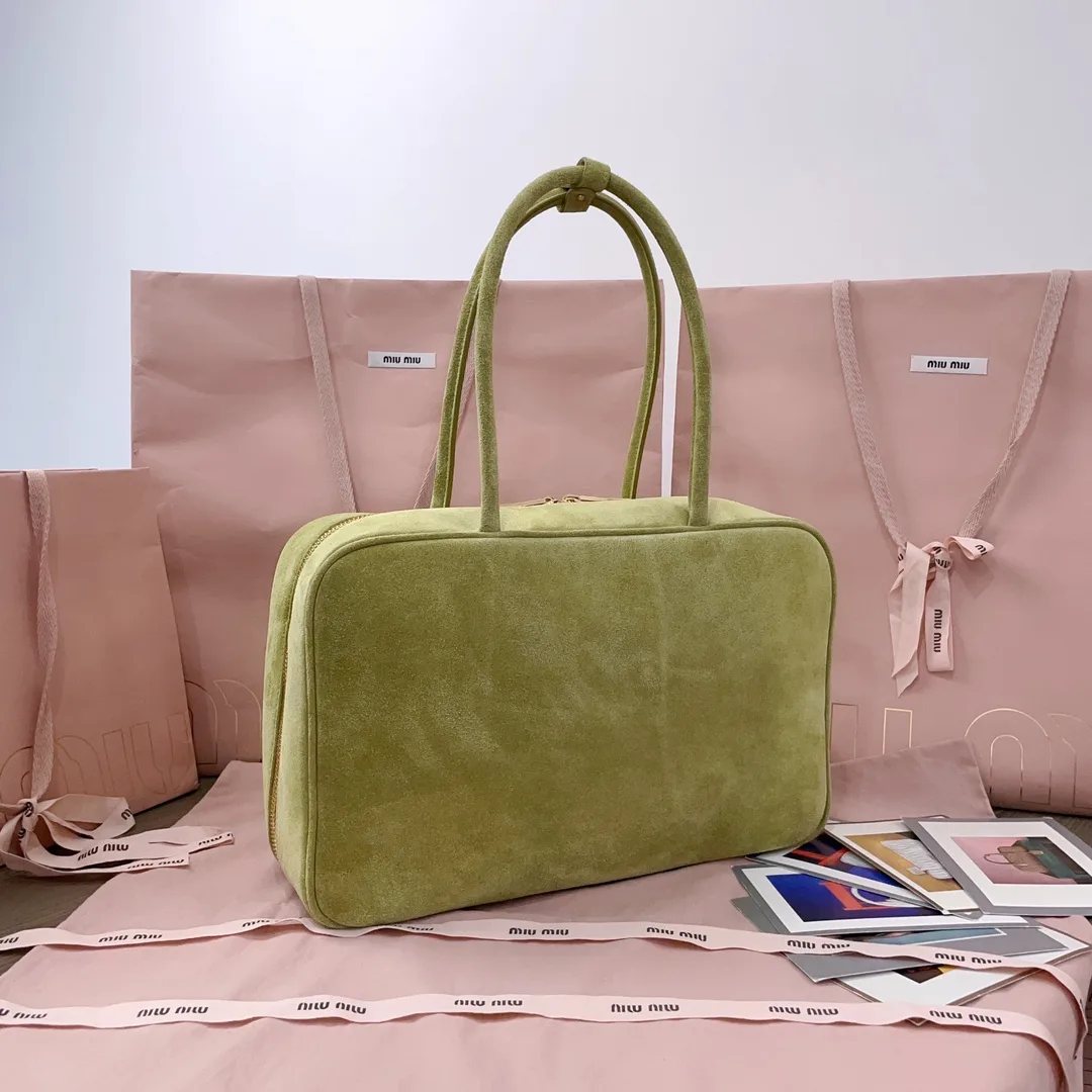 Miu Miu Canvas and Leather Crossbody Bag product photo from LabelPicks