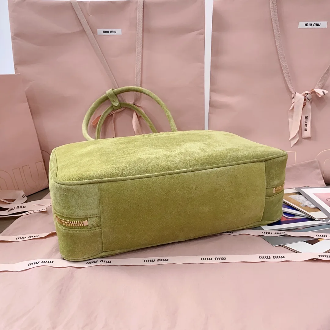 Miu Miu Canvas and Leather Crossbody Bag product photo from LabelPicks