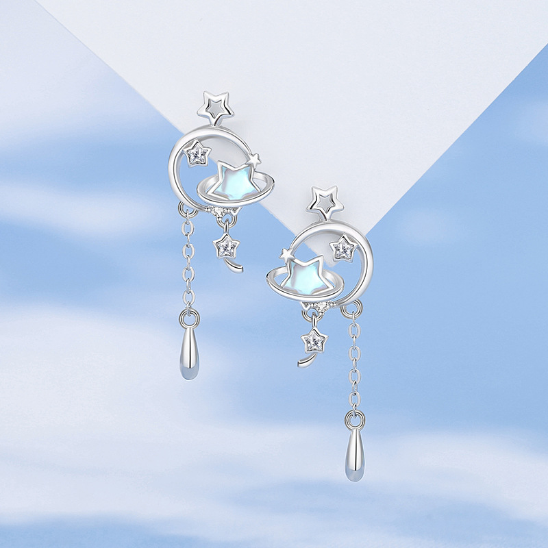 Original Korean-style star earrings for women, made of pure silver, featuring a fresh and delicate design with tassels, perfect for summerKorean-style moonstone earrings, a trendy accessory