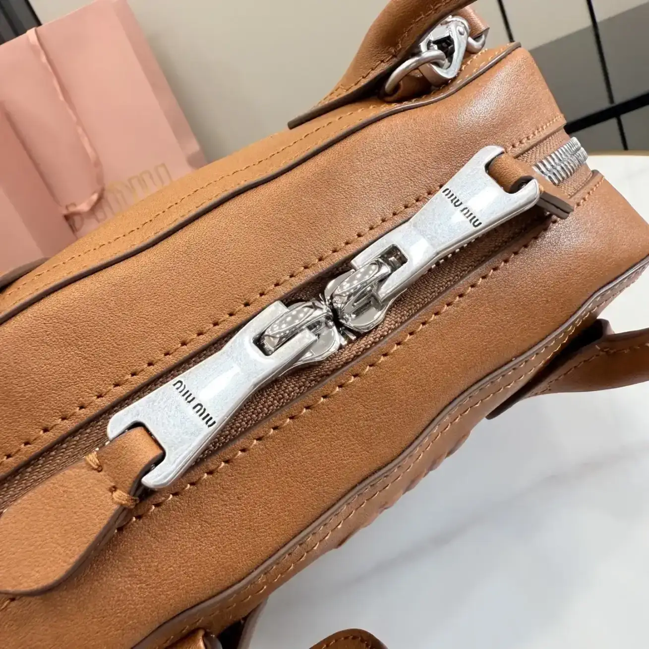 Miu Miu Lambskin Vivant Top Handle Bag product photo from LabelPicks