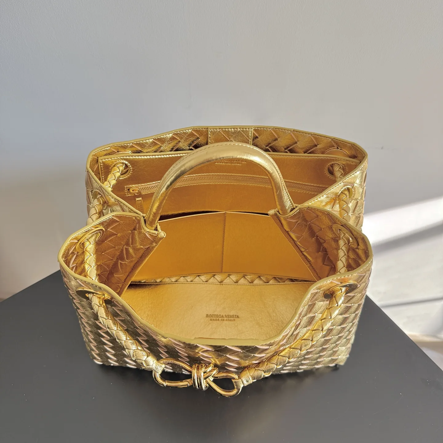 Bottega Veneta Gold Andiamo Intrecciato Woven Leather Top Handle Bag product photo from LabelPicks