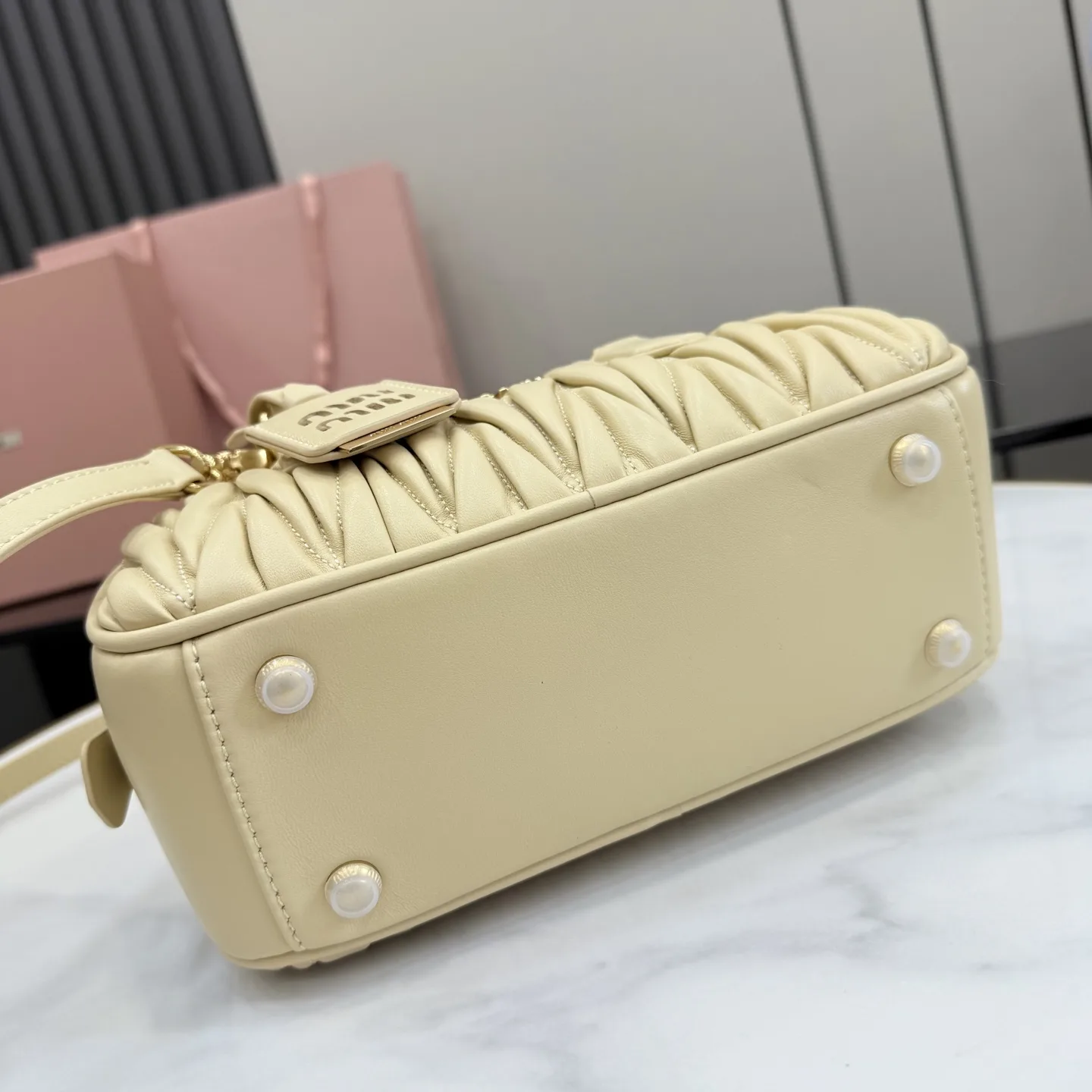 Miu Miu Lambskin Matelasse Top Handle Bag product photo from LabelPicks