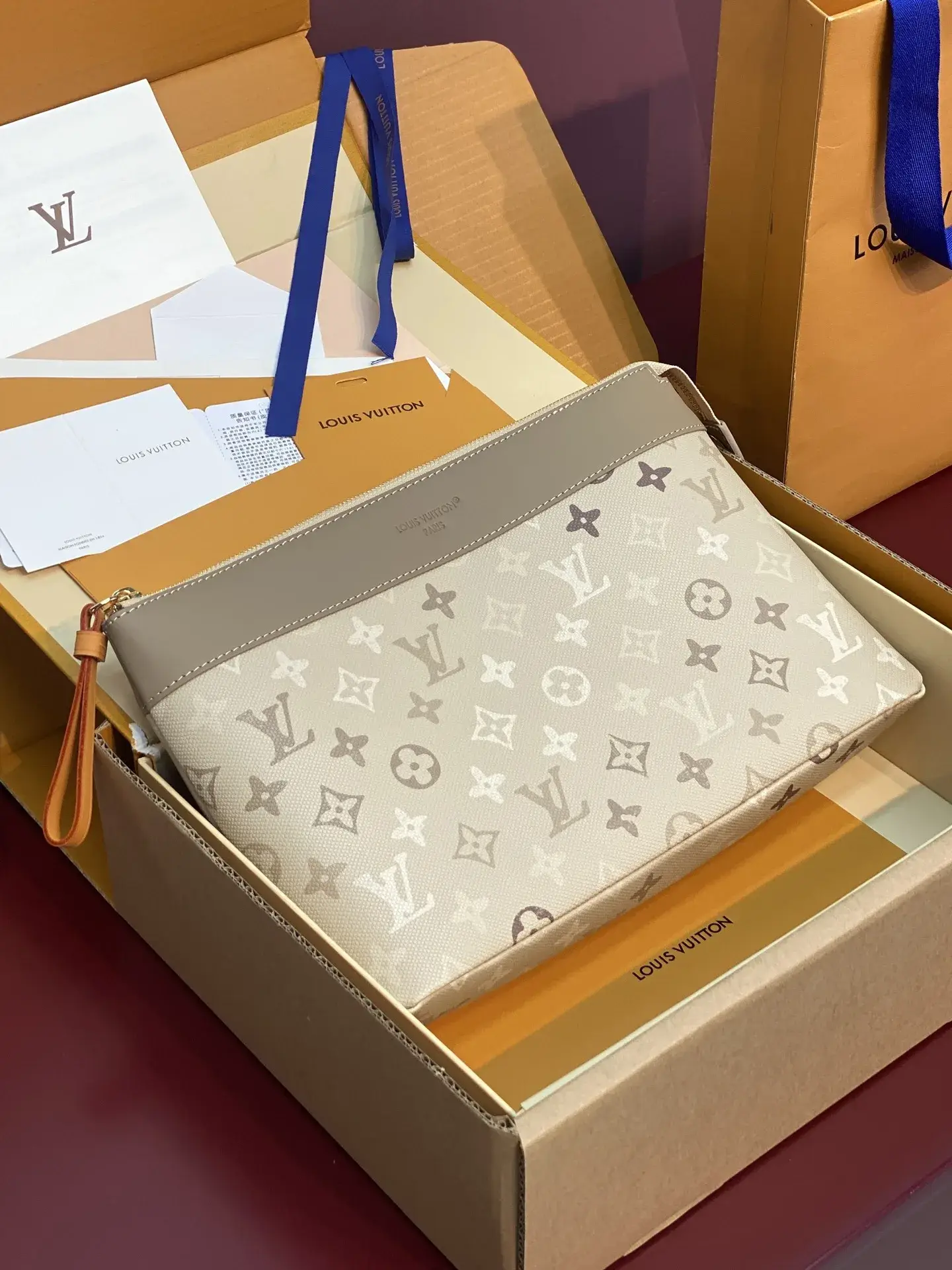 Louis Vuitton Red Pochette Canvas and Leather Clutch product photo from LabelPicks