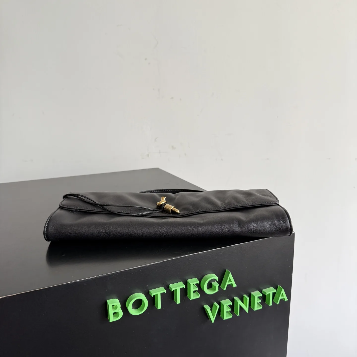 Bottega Veneta Andiamo Intrecciato Woven Leather Clutch product photo from LabelPicks