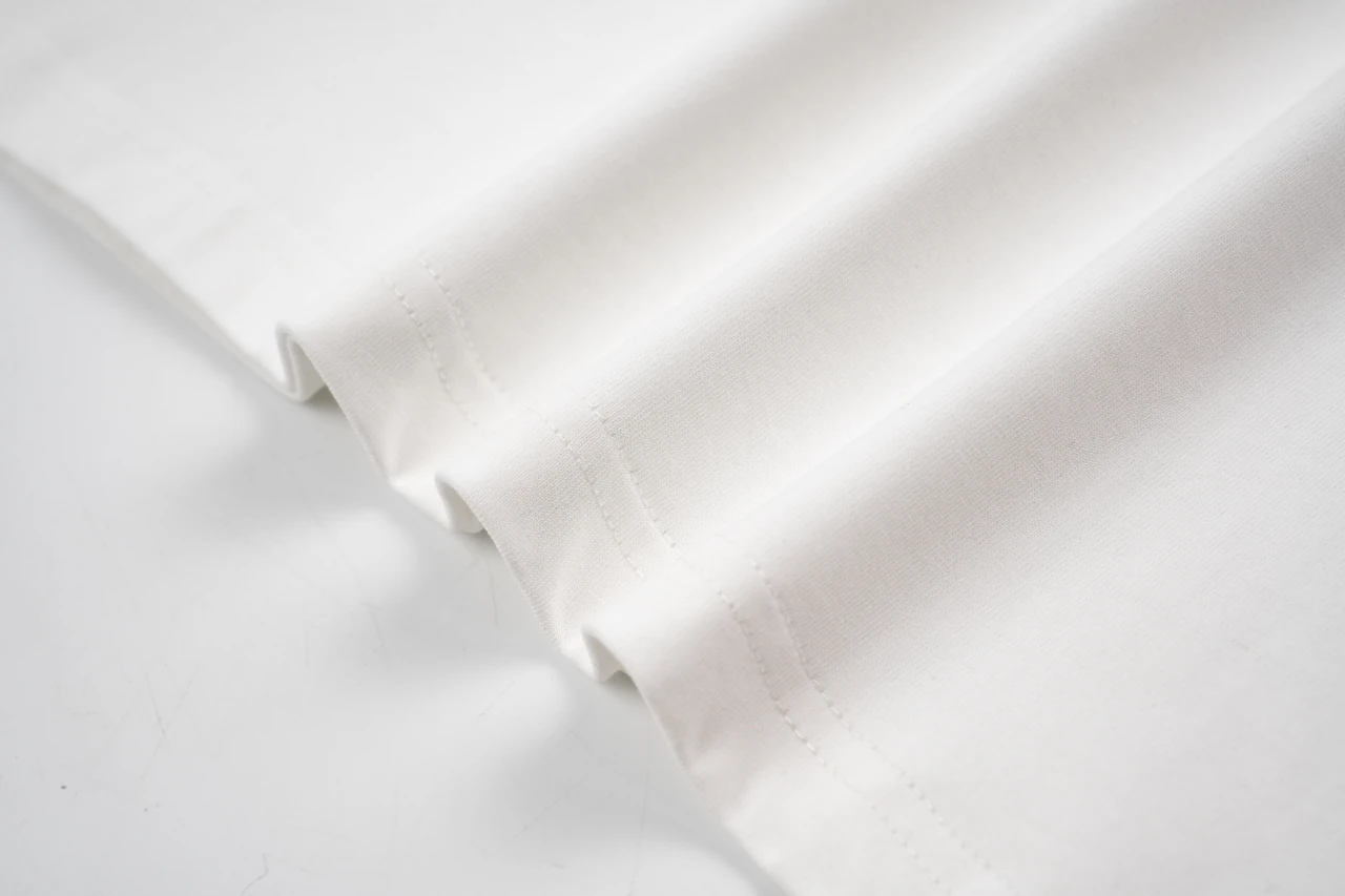 Bottega Veneta White Slogan Print T-Shirt product photo from LabelPicks