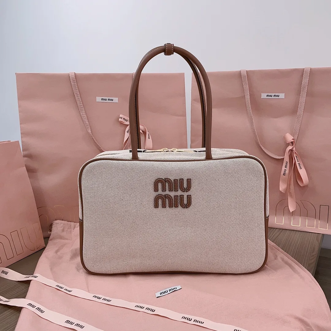 Miu Miu Canvas and Leather Crossbody Bag product photo from LabelPicks