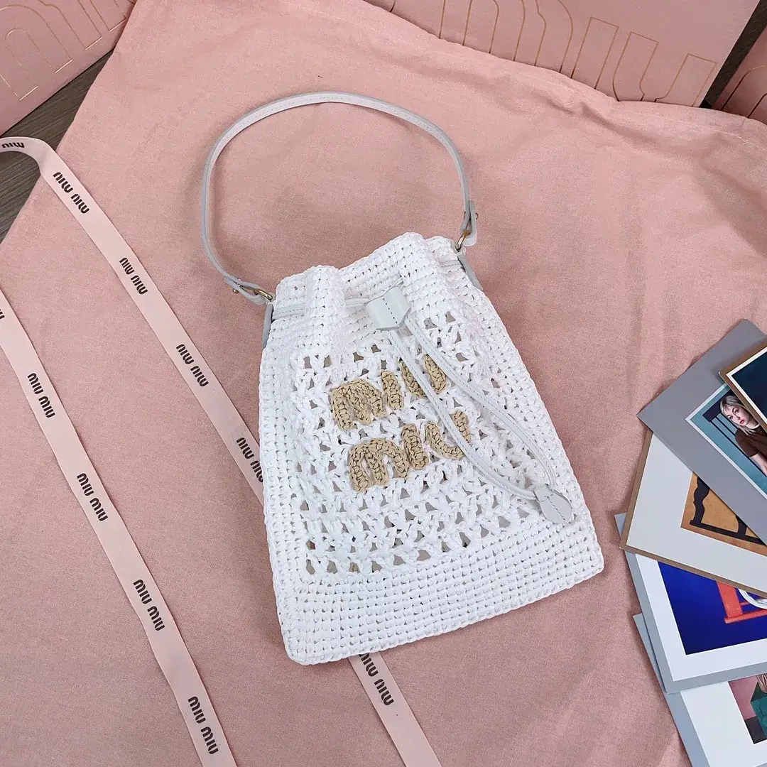Miu Miu Woven Leather Bucket Bag product photo from LabelPicks