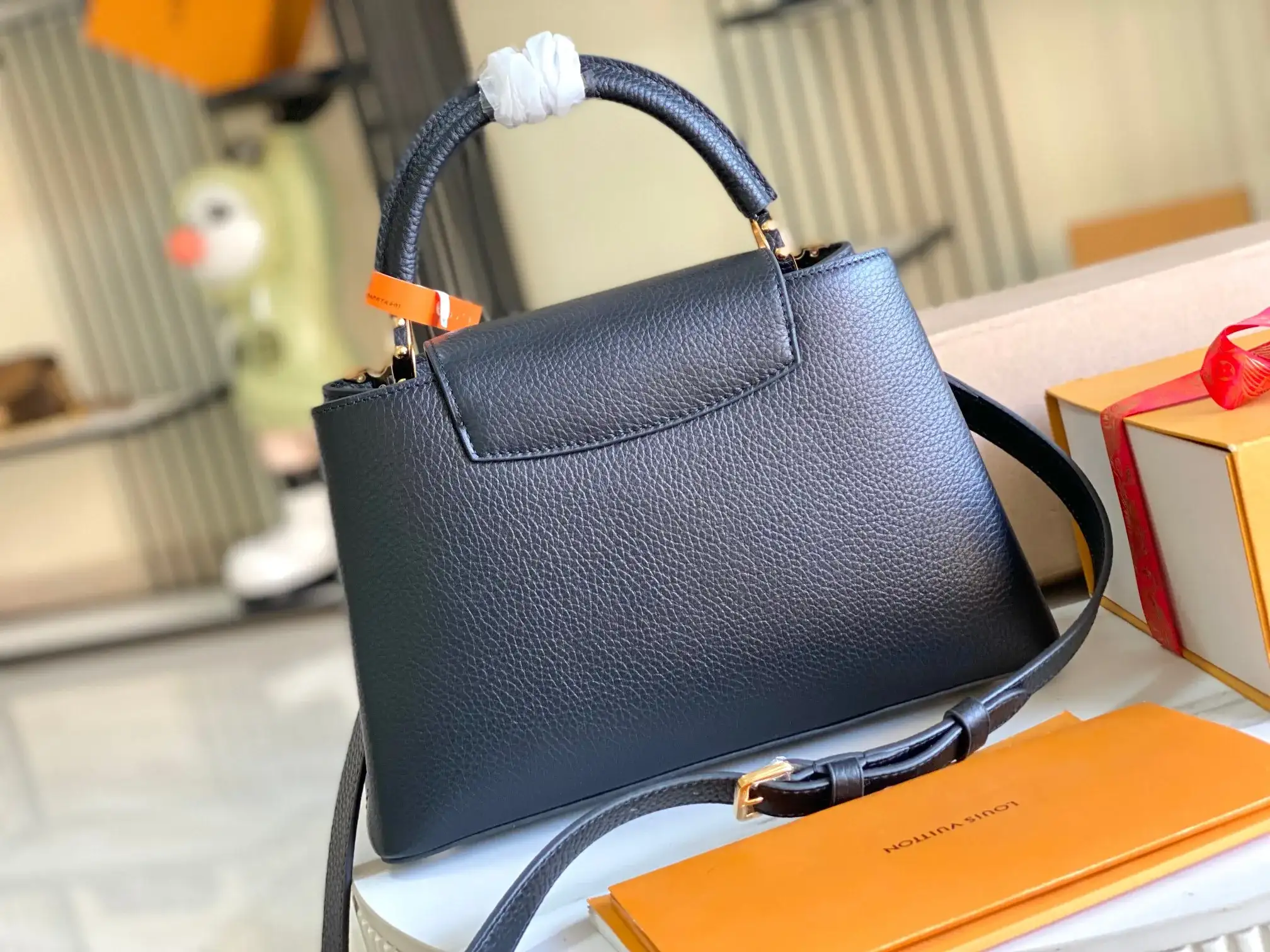 Louis Vuitton Capucines Black Grained Leather Crossbody Bag product photo from LabelPicks