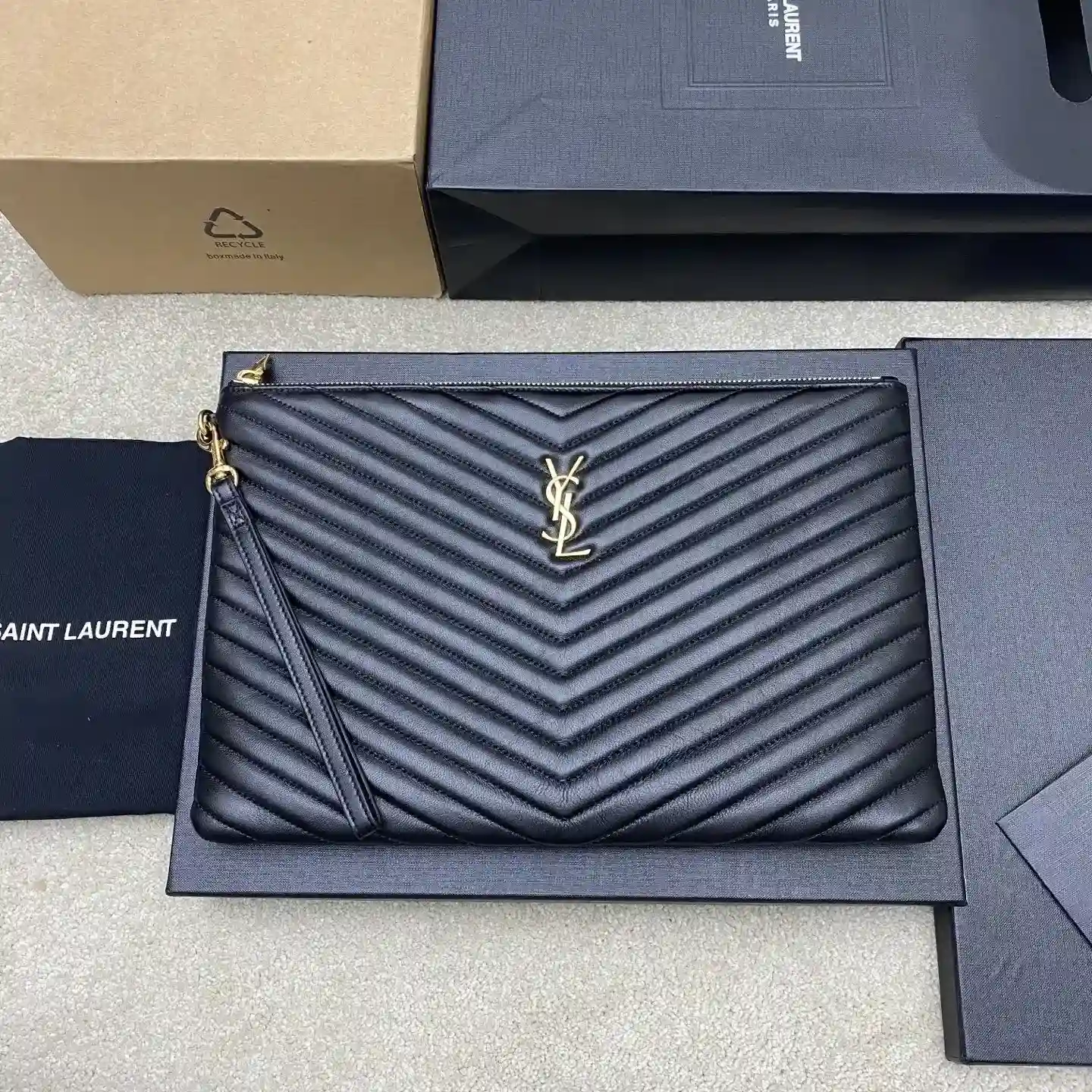 Saint Laurent Quilted Leather Clutch product photo from LabelPicks