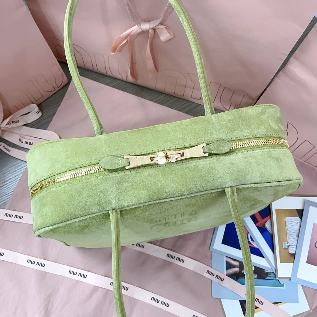 Miu Miu Canvas and Leather Crossbody Bag product photo from LabelPicks